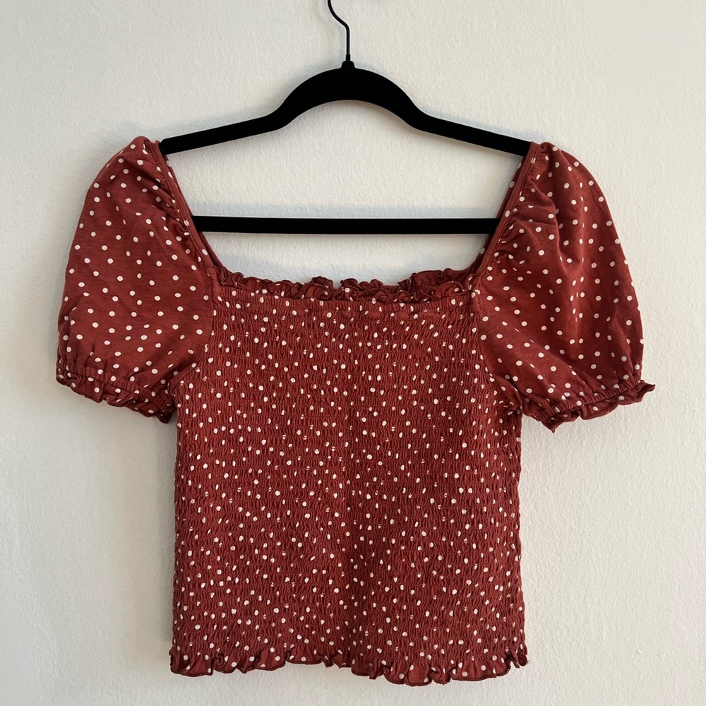 American eagle brown top with polka dots in a XS